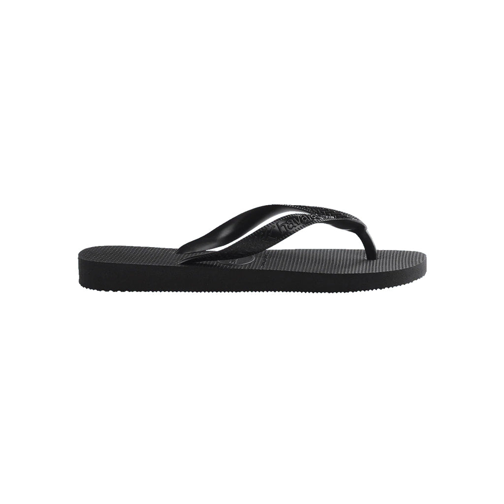 Side view of black Havaianas Top Thongs showing the textured sole and strap.